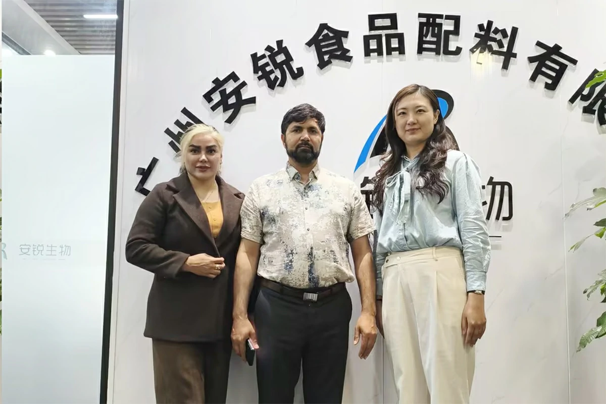 Anrui Biotech office photo with international client visit, showcasing trust, hospitality, and strong customer relationships.